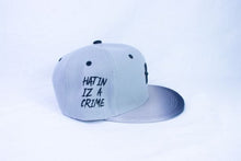 Load image into Gallery viewer, Hiac Brands Two Tone Signature H Logo w/ Hatin Iz A Crime on side Snapback Hat